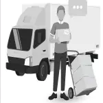 A man with a sack truck standing near a large van